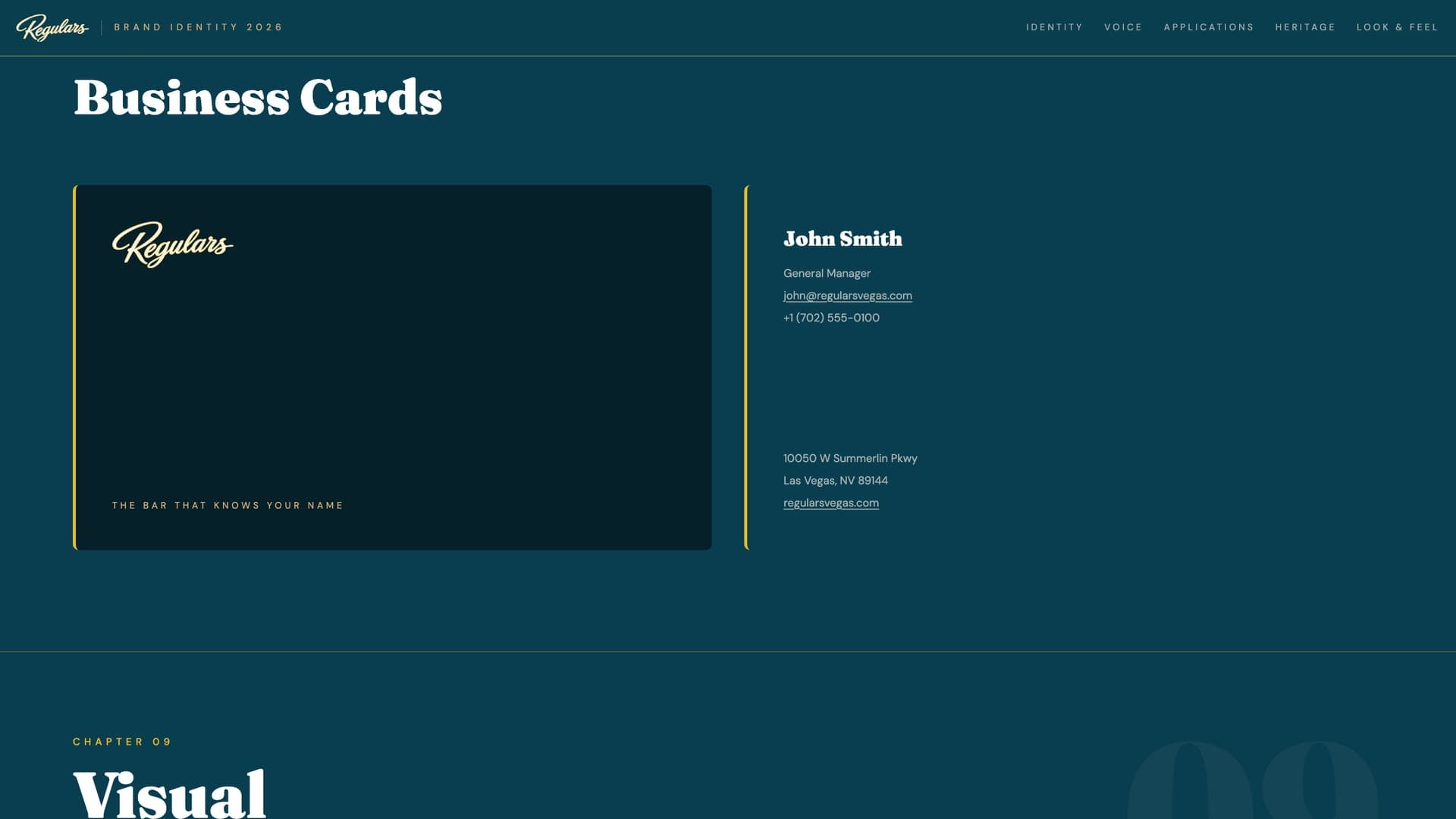 Business card front and back on Midnight Peacock with the script logo and a gold rule